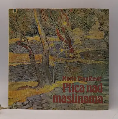 Naslovnica: Ptica nad maslinama